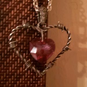 Beautiful silver barbed wire heart necklace